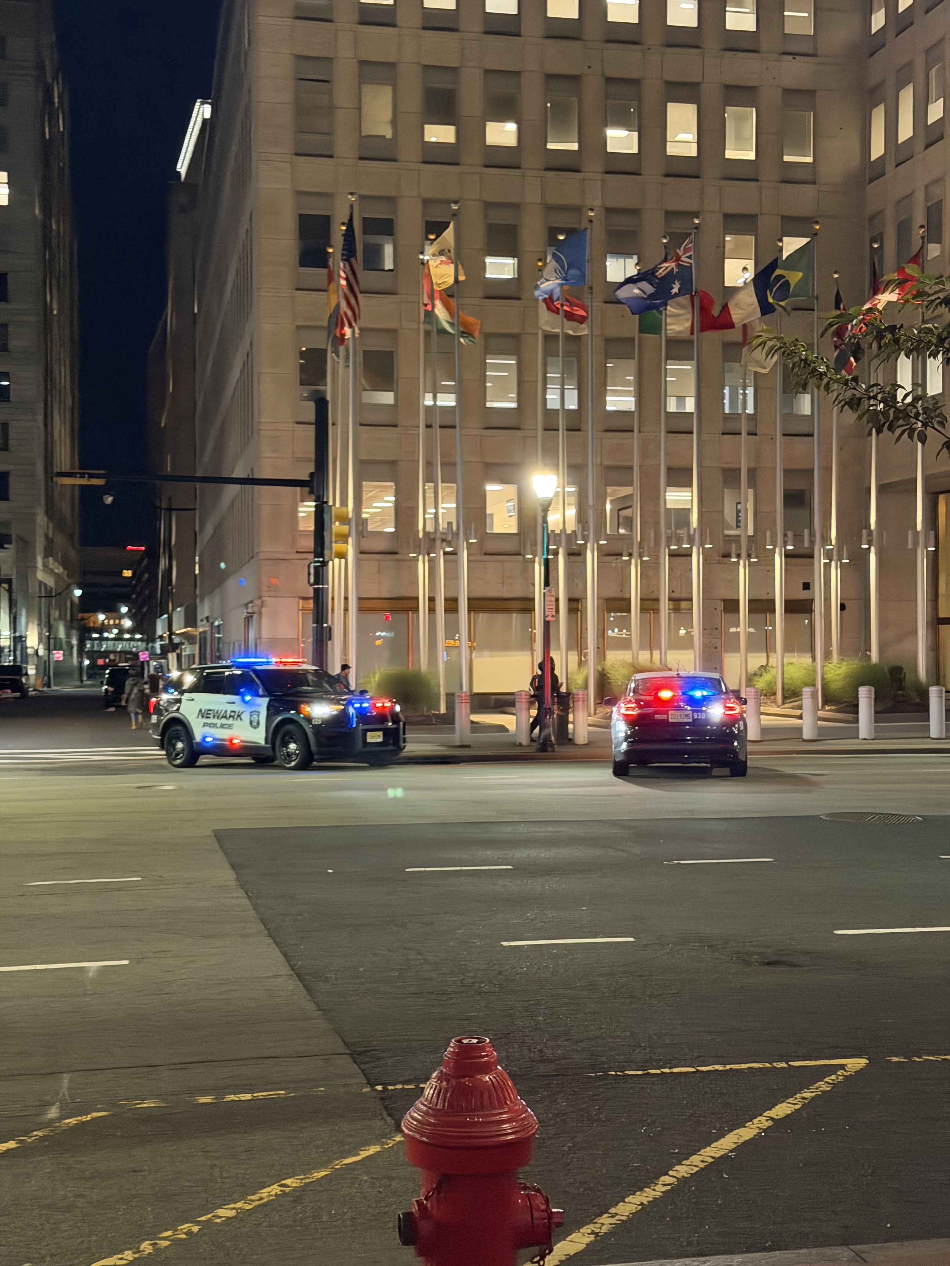 Marked Newark police vehicles at the downtown scene late on October 5, 2026. Photo: Jersey Alerts.
